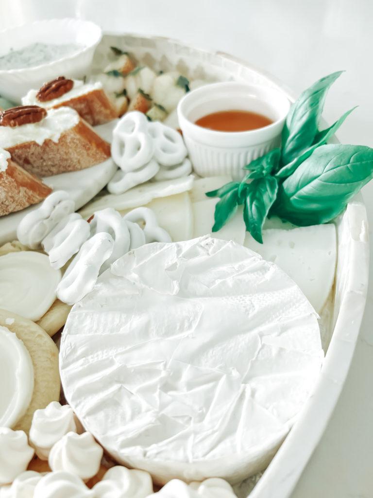 A classy white cheese platter 