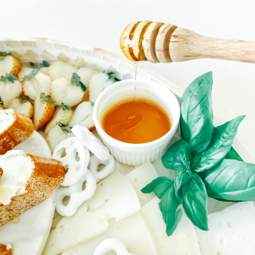 A classy white cheese platter 