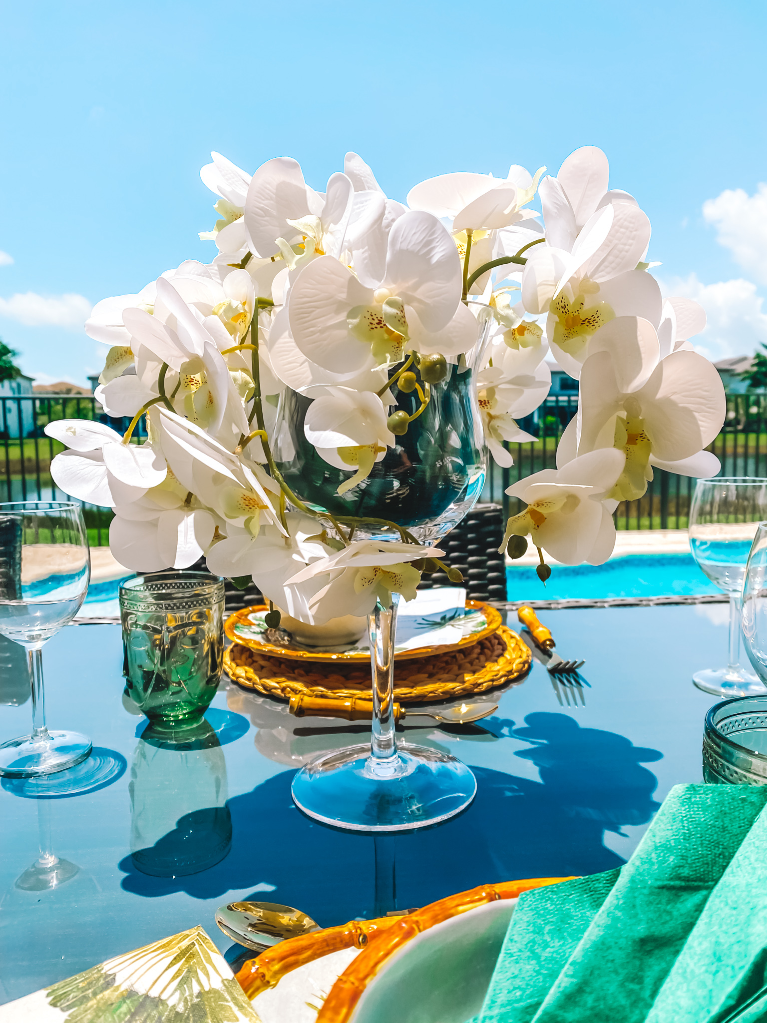A TROPICAL FLOWER ARRANGEMENT WITH ORCHIDS