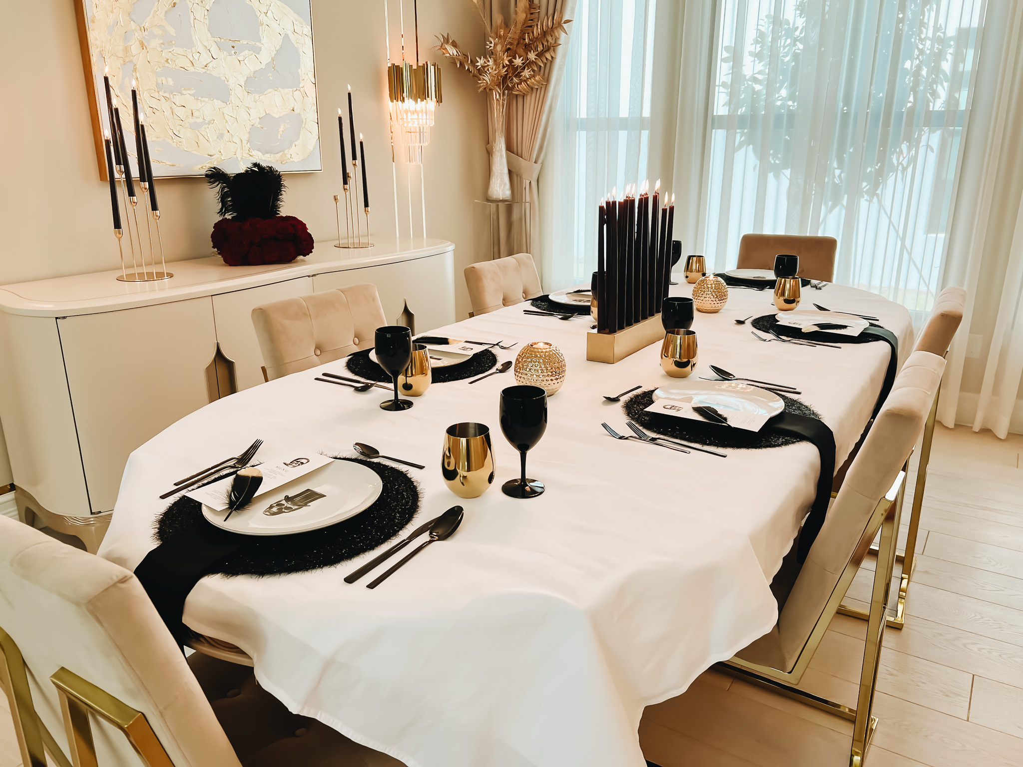 A BLACK AND WHITE HALLOWEEN SKELETON TABLE 