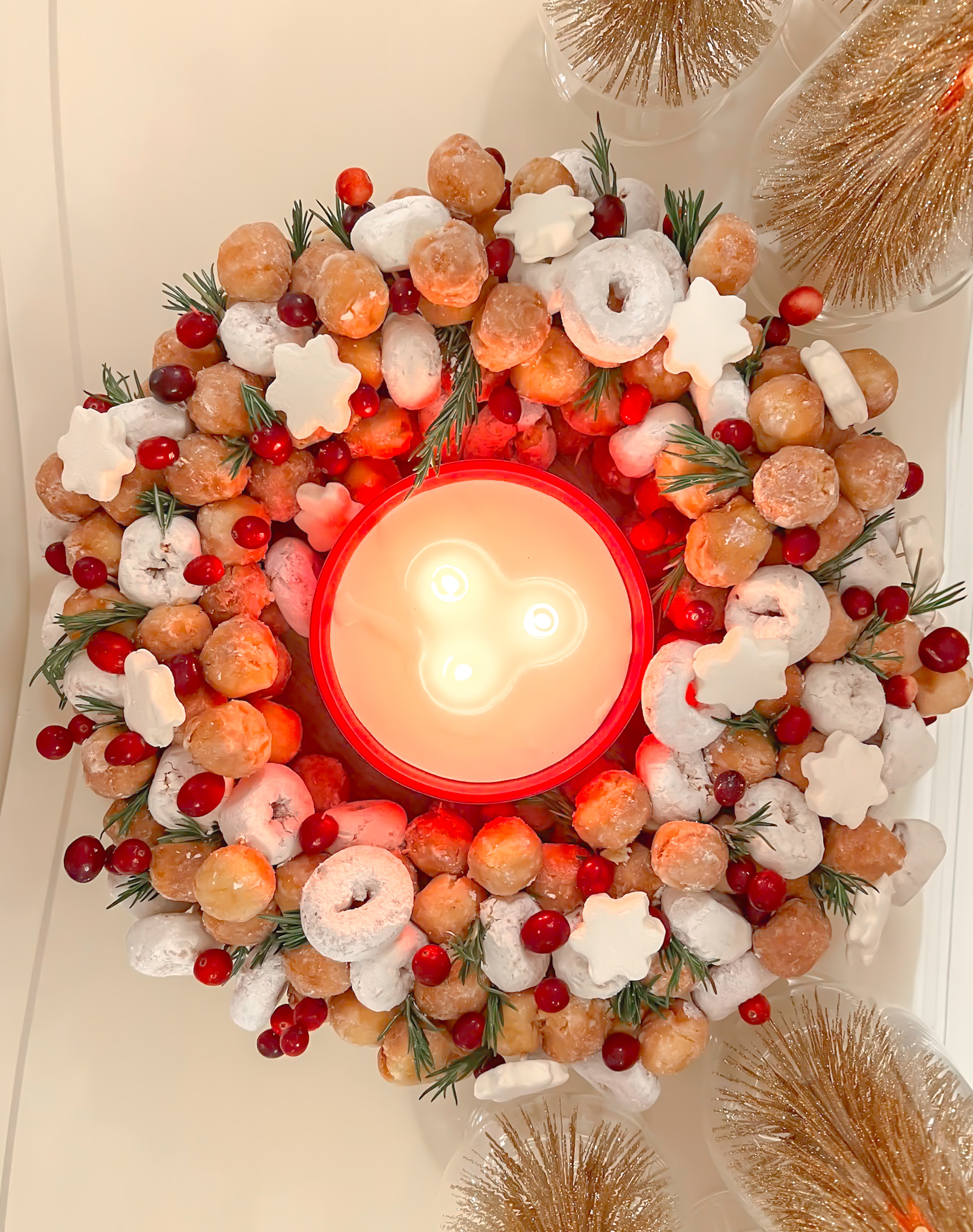 HOW TO CREATE A FESTIVE DONUT WREATH THAT WILL STEAL THE SHOW THIS HOLIDAY SEASON
